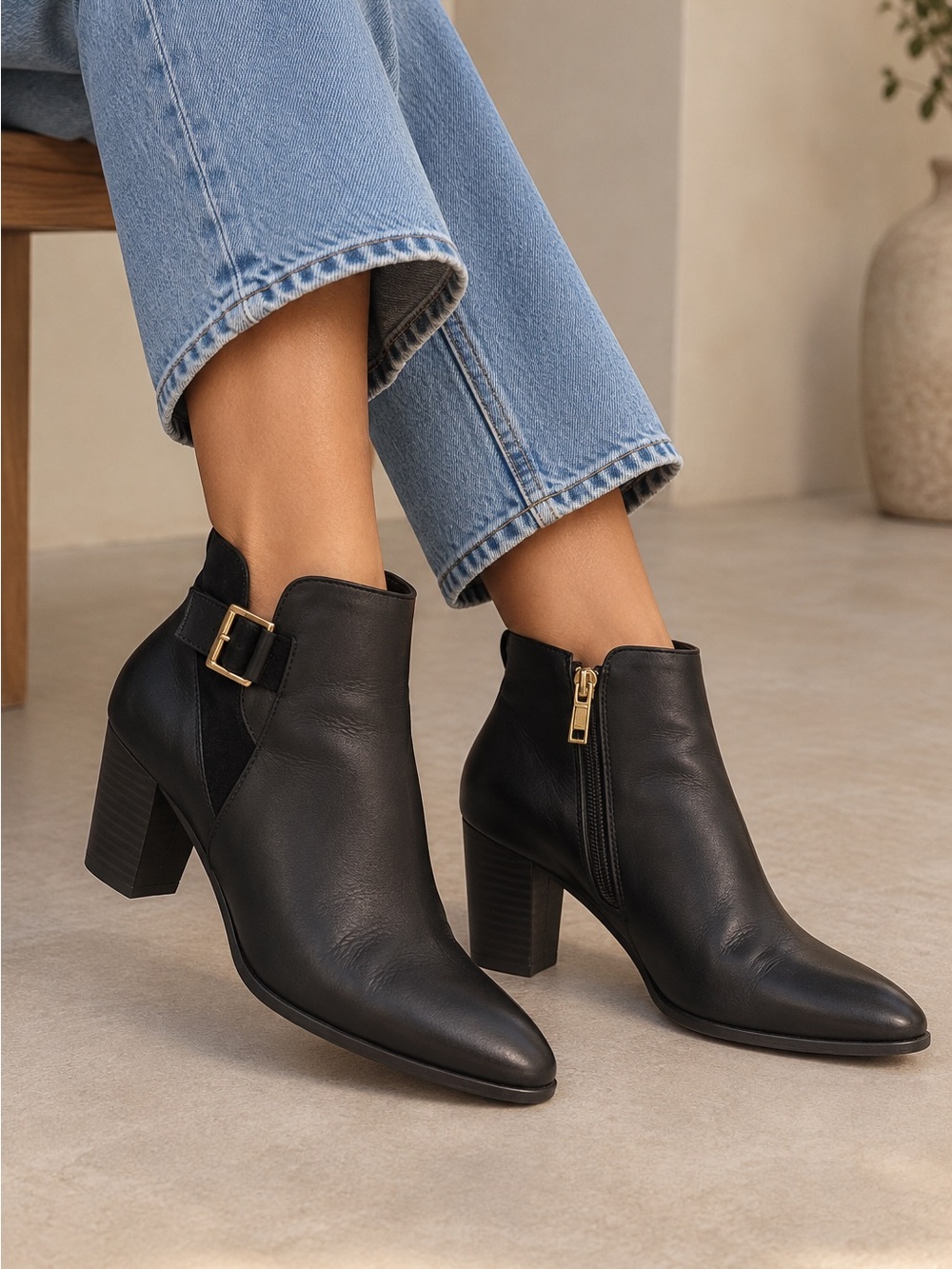 Louise et Cie Black Leather Ankle Booties with Gold Zipper Accent